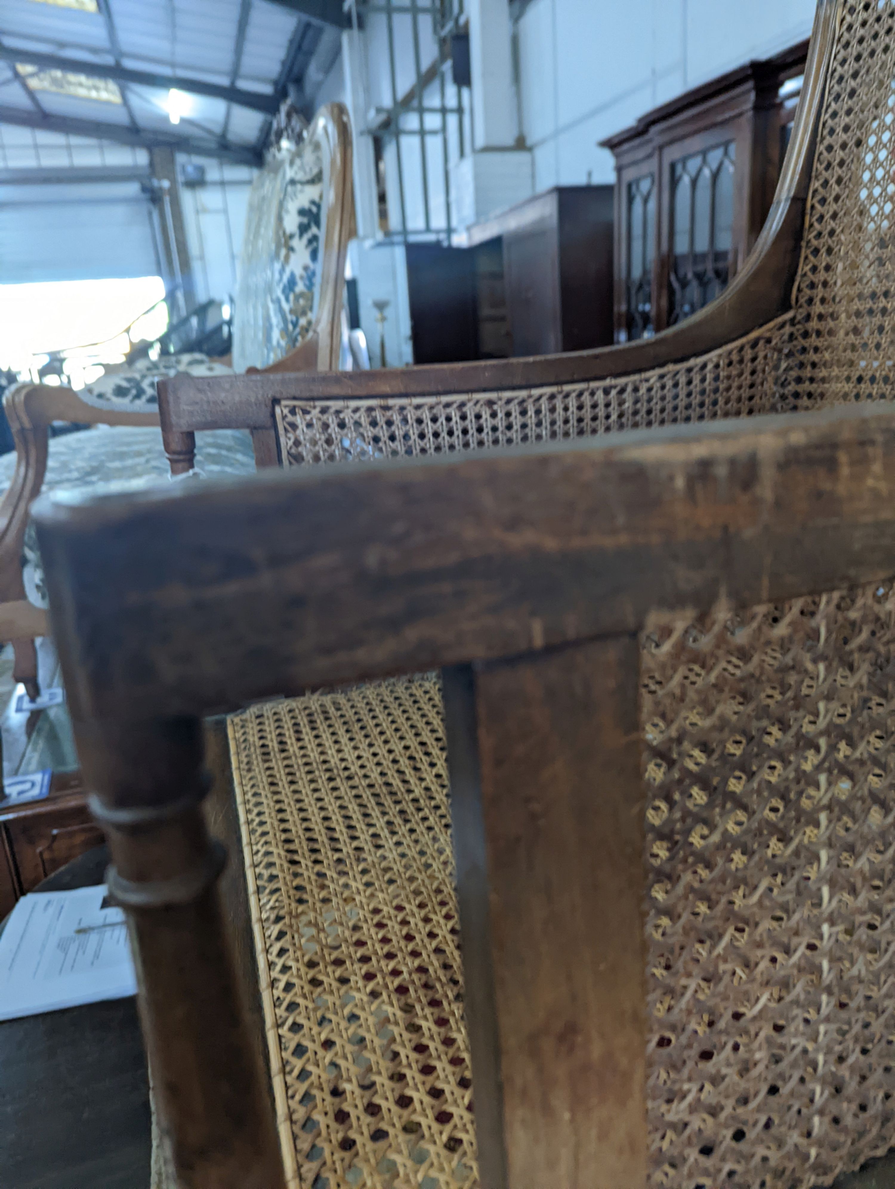 A Regency style mahogany bergere armchair, width 59cm, depth 56cm, height 97cm